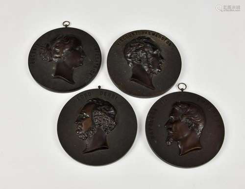 Four Bois Durci vulcanite portrait relief roundels / plaques...