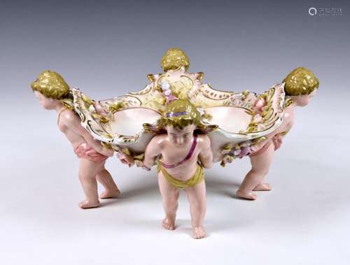 A German Schierholz porcelain figural compote or table centr...