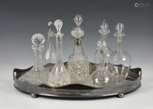 A collection of eight various glass decanters