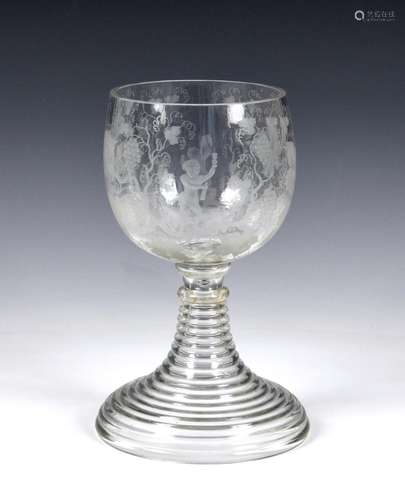 A Victorian oversized glass goblet having etched decoration ...