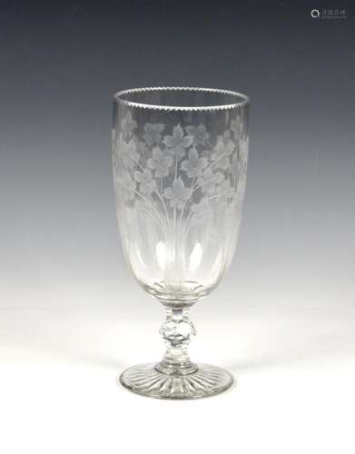 A Victorian etched glass celery vase unusually etched with c...