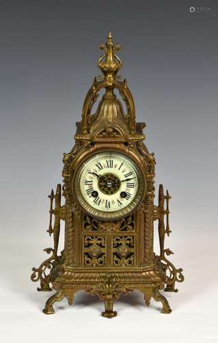 A French cast and pierced brass mantel clock, late 19th cent...