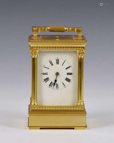 A Grande Sonnerie gilt brass carriage clock with push button...