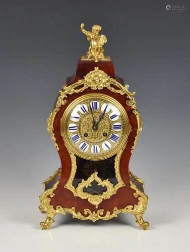 A 19th century tortoiseshell and gilt metal mantel clock wit...