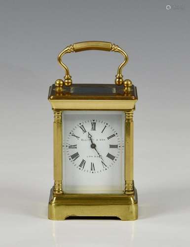 A miniature brass carriage clock by Elliott & Son, Londo...