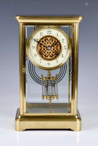 A French four glass brass cased mantel clock