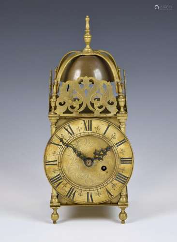 An early 20th century lantern clock with brass 16cm. Roman d...