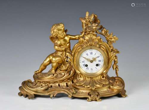 A French ormolu rococo revival mantel clock