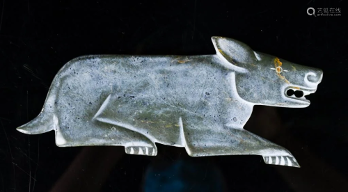 A Celadon Jade Carved Dog