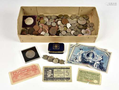 A rummage box of Guernsey coinage, FDC's and German occu...