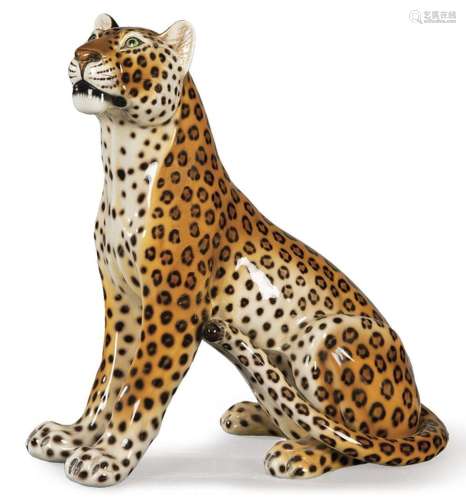 Figure of a leopard in painted and glazed ceramic. 20th cent...
