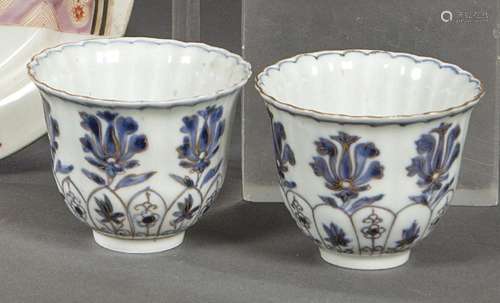 Pair of blue and white Chinese porcelain cups with golden de...