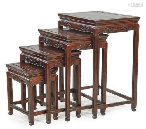 Four Chinese teak wood nesting tables S. XIX.