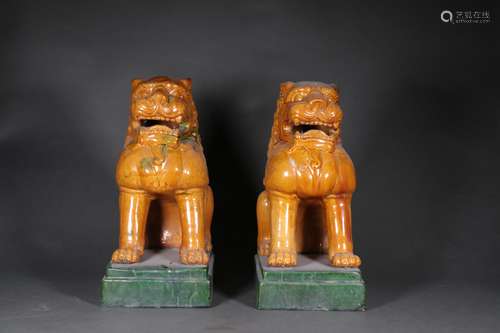 Pair of Yellow Glaze Lion Statues