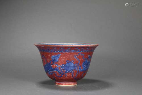 Red-Ground Blue and White Dragon Bowl