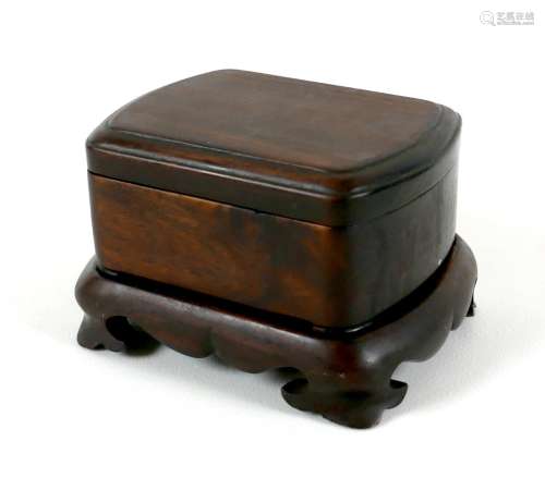 A Chinese carved wooden seal box, on stand, late 20th centur...