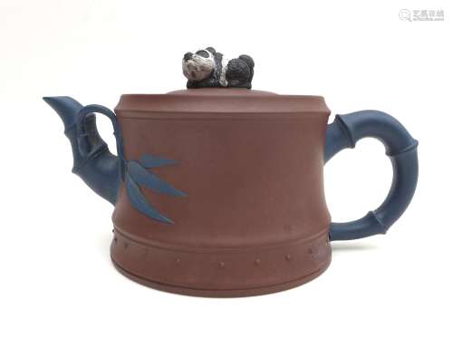 A Chinese Yixing pottery teapot, with panda form finial, con...