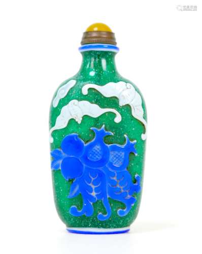 A Chinese glass scent bottle, flashed blue and white, decora...