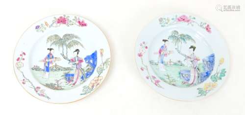 A pair of Chinese famille rose porcelain dishes, decorated ....