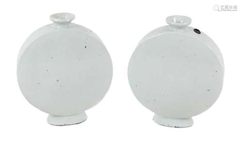 A pair of Chinese porcelain moon flasks, early to mid 20th c...