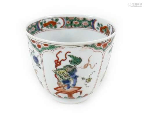 A Chinese porcelain tea bowl, Kangxi mark and period, decora...