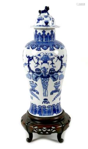 A Chinese porcelain vase, Qing Dynasty, 19th century, of bal...