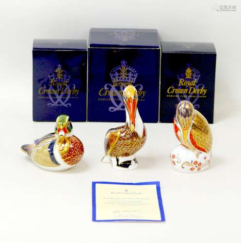 Three Royal Crown Derby paperweights, modelled as the limite...