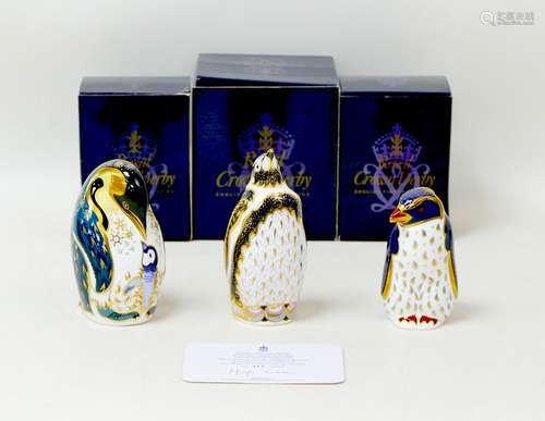 Three Royal Crown Derby Paperweights, modelled as penguins, ...