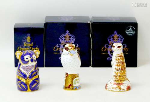 Three Royal Crown Derby paperweights, modelled as a Kookabur...