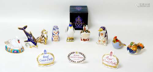 Twelve Royal Crown Derby paperweights, modelled as an Empero...