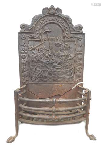 An 18th century cast iron fire grate with embossed scene to ...