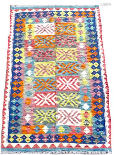 A Chobi Kilim rug, the multicolour ground with fourteen rect...