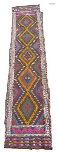 An old Suzni Kilim runner, with five central, caucasian, ora...