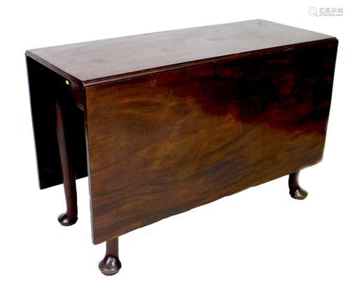 A mahogany drop leaf table, with gate leg action, raised on ...