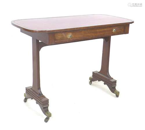 A Regency mahogany writing table, with red leather top and s...