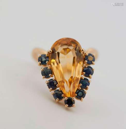 159 Bague en or jaune ornée d'une citrine poire soulignée de...