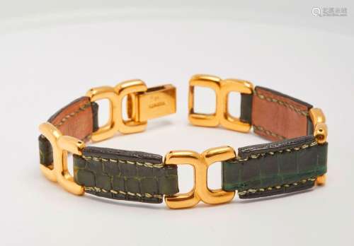 172 HERMES : Bracelet boucles métal plaqué or et cuir façon ...