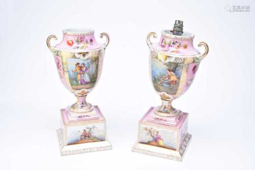 A pair of late 19th century, Continental painted urns