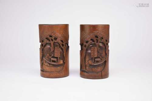 A pair of Chinese carved bamboo brush pots