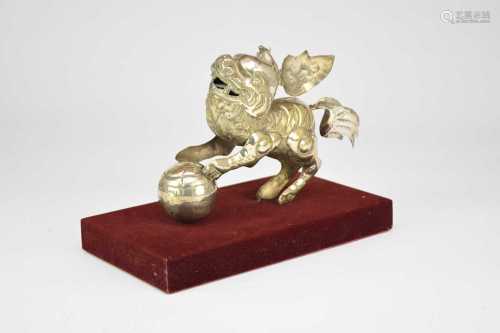 A Chinese silver-plated fo dog