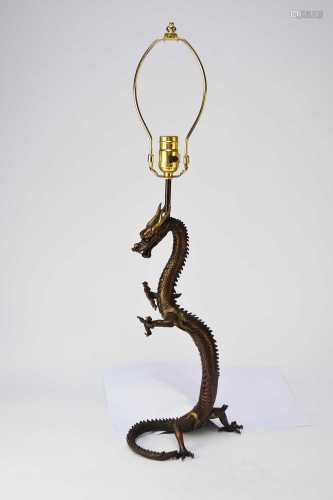 A Chinese bronze dragon table lamp