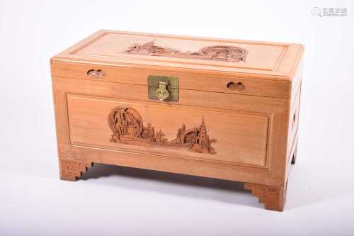 A Chinese carved wood, camphor-lined blanket chest
