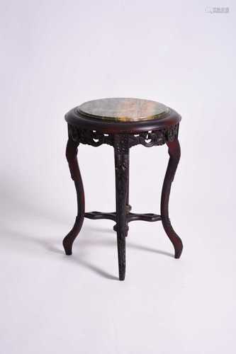 A Chinese rosewood and marble vase stand