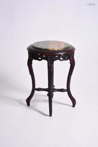 A Chinese rosewood and marble vase stand