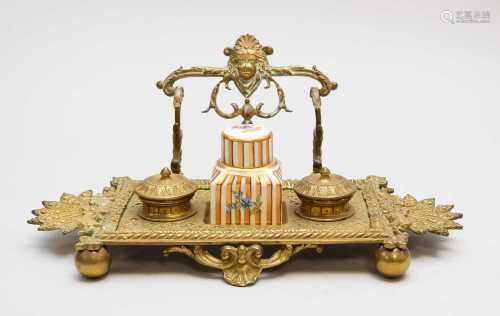 A late Victorian brass standish, or inkstand and a porcelain...