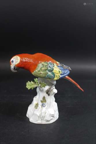 MEISSEN PARROT 20thc, brightly painted with the Parrot perch...