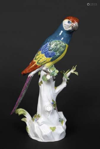 MEISSEN PARROT 20thc, the brightly painted Parrot resting on...