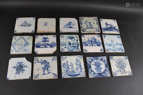 COLLECTION OF DELFT TILES a collection of 15 blue and white ...