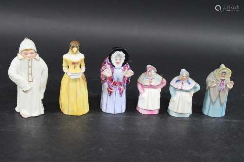 ROYAL WORCESTER CANDLE EXTINGUISHERS including a figure of J...