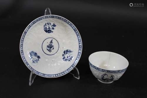 LOWESTOFT TEA BOWL & SAUCER a Hughes type painted and mo...